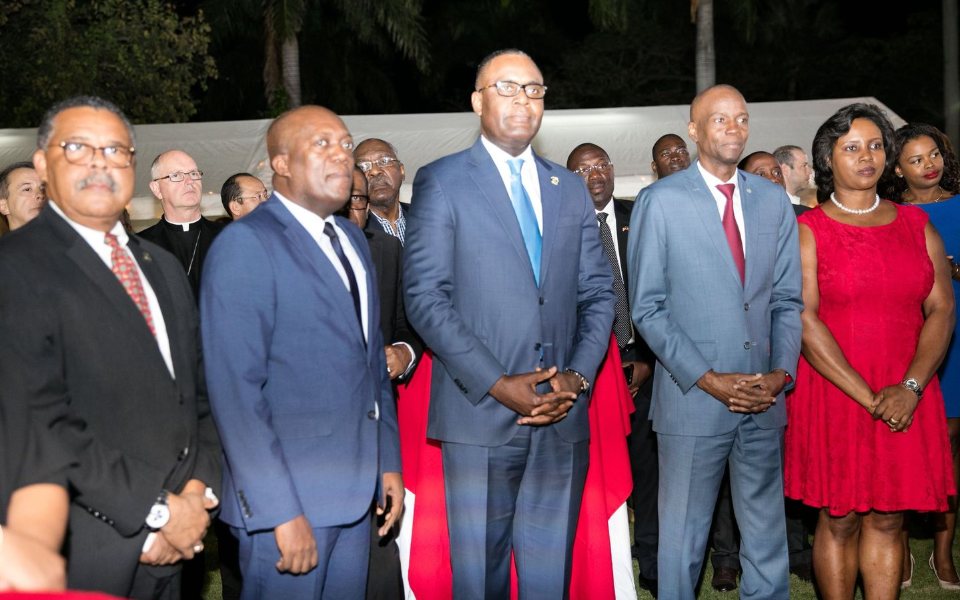 Martine Moïse and President Jovenel Moïse at an American Chamber of Commerce in Haiti meeting in December 2018