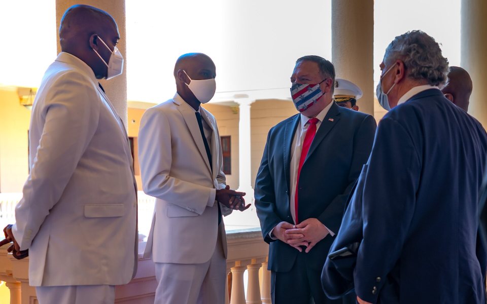 President Jovenel Moïse meets U.S. Secretary of State Mike Pompeo in August 2020, less than a year before his assassination